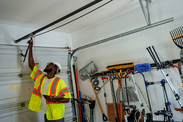Professional Garage Door Panel Replacement technician working in Yadkinville, NC